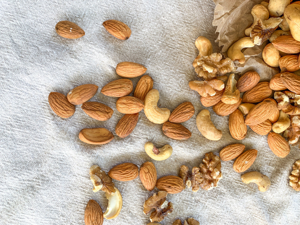 Naked Paleo Blog Recipe Why We Love and Use Nuts as an ingredient in our whole food bars healthy fat fats